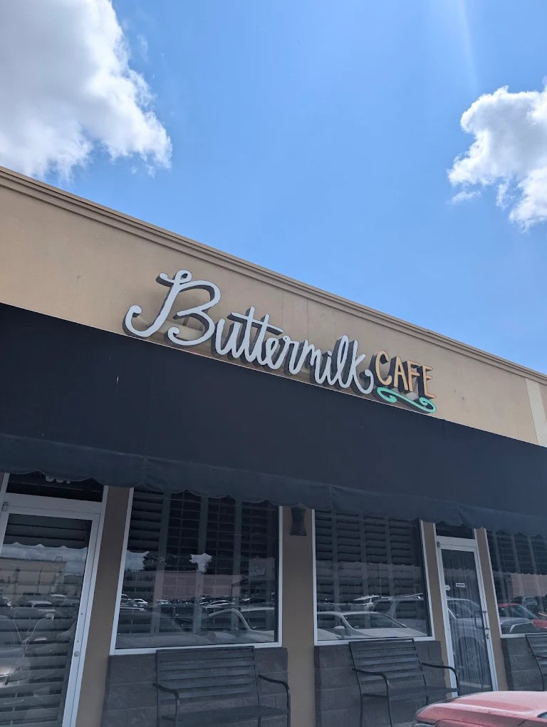 The humble façade of Buttermilk Café keeps it simple, with outdoor seating for guests waiting to enjoy a hearty meal. Credit: Samantha Edwards (Sam)