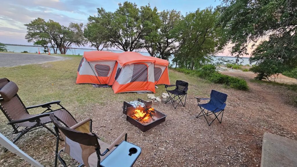 Camping at Lake Whitney offers trailside views overlooking the lake, perfect for outdoor enthusiasts. Credit: Michael Thompson