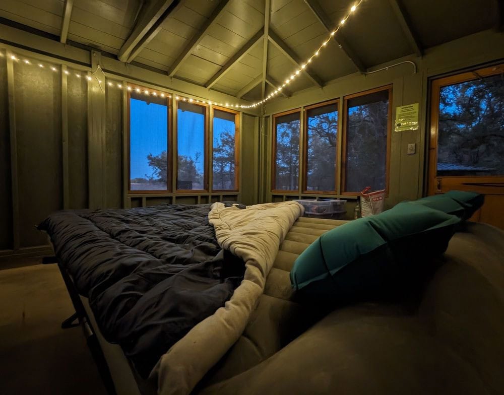 - Inside the cabin, spacious rooms with lights, windows, and netting for mosquito protection ensure a comfortable stay.
