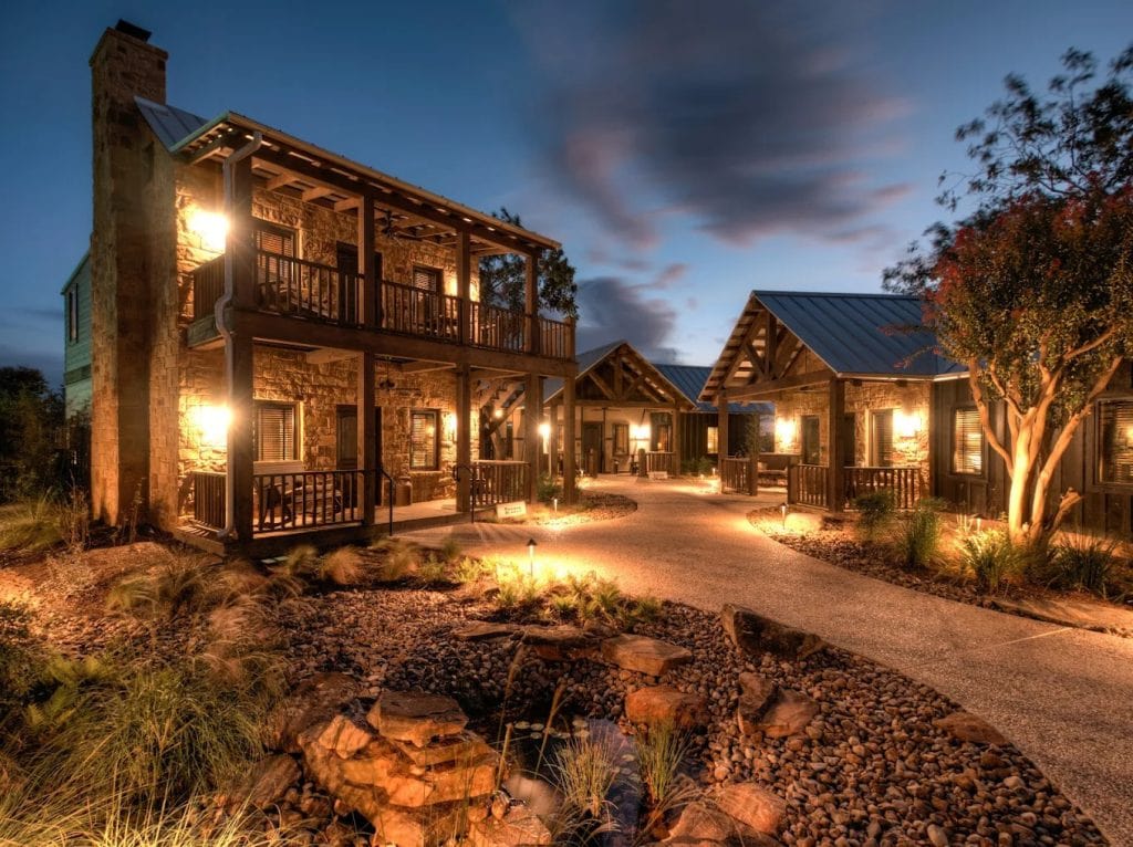 Rustic cabins at Cotton Gin Village offer a cozy retreat surrounded by charm and nature. Credit: Cotton Gin Village