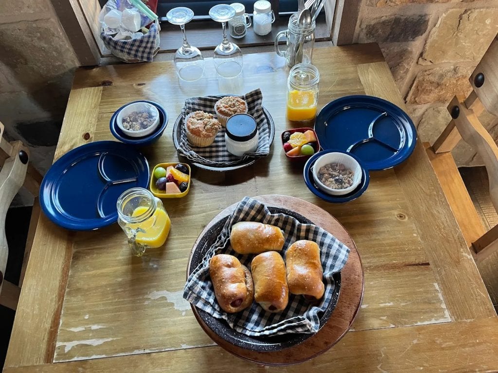 Another breakfast spread variation features oats, fruits, fresh OJ, sausage kolaches, and muffins. Credit: Valentina Uzcategui