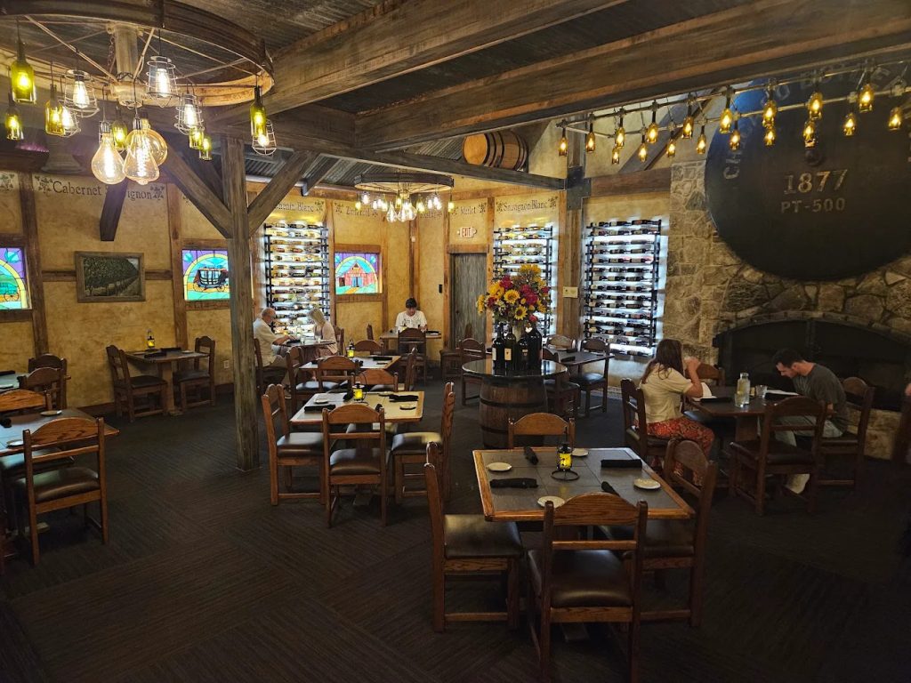 Cabernet Grill’s intimate rustic interior matches the village’s theme, serving elevated dishes in style. Credit: Josh Hockett