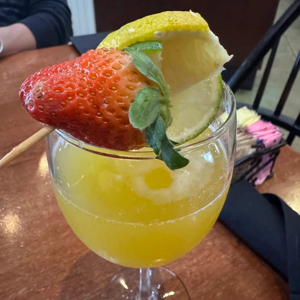 A strawberry-lime mimosa proves Buttermilk Café serves more than breakfast—it serves a good time. Credit: Nellie BlackBrett