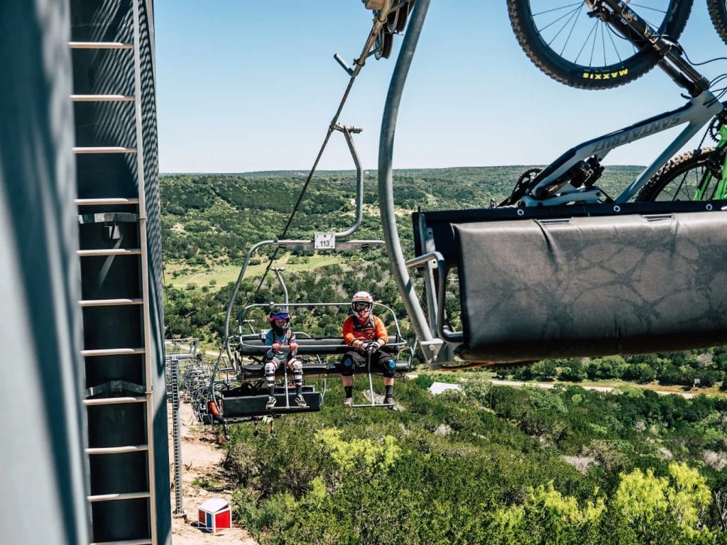 The Texas Eagle chairlift carries riders and their bikes to the summit for thrilling downhill adventures. Credit: ￼Spider Mountain Bike Park