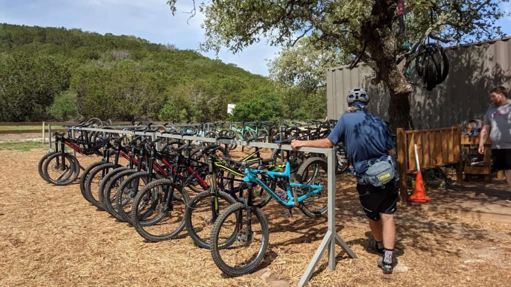 Rows of mountain bikes line up, ready for use by riders of all skill levels. Credit: Suzanne D.
