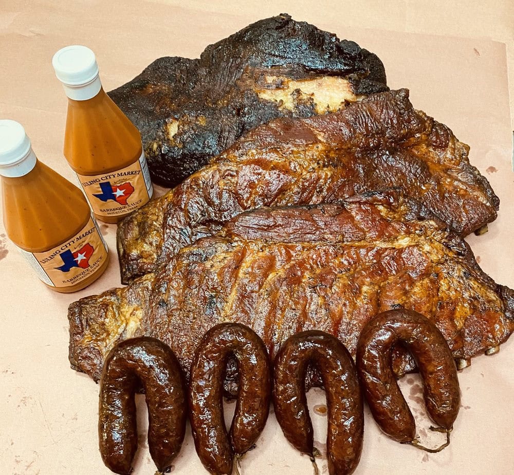 City Market serves three legendary meats—brisket, sausage, and ribs—paired with their signature sauce. Credit: Luling City Market