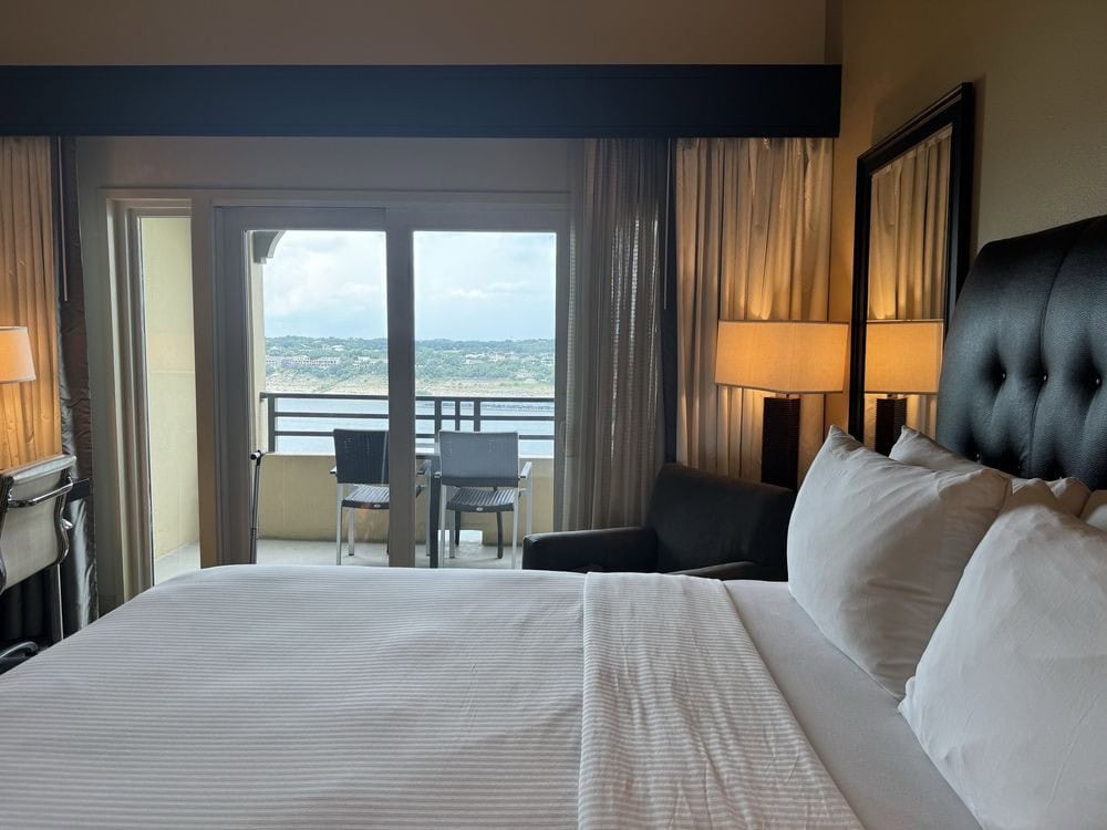 Double queen rooms with lake views feature balconies, spacious layouts, and cozy, clean interiors. Credit: Loyda E.