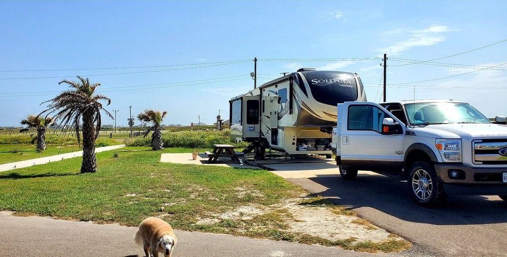 Campsite 8 sits near a walkway to the beach, with hookups and its own picnic table. Credit: Kathy M.