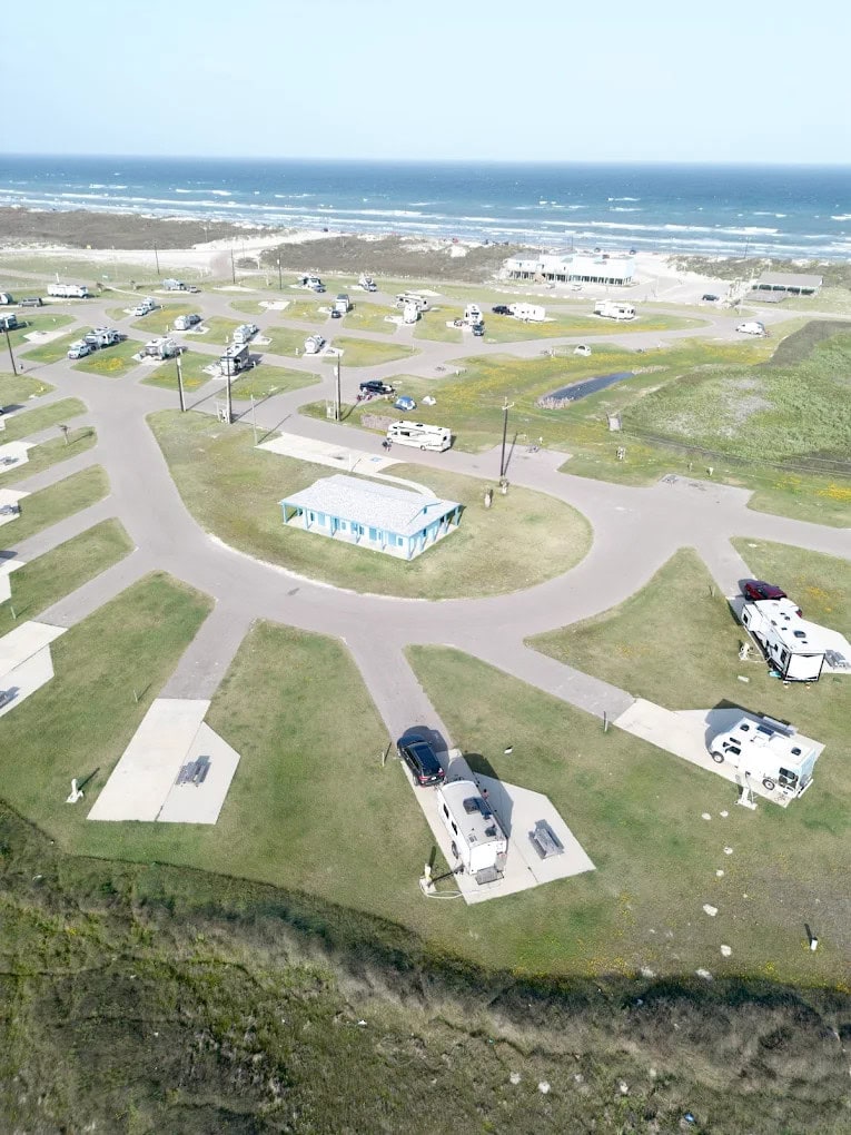 An aerial view of the park shows the coastline and spacious RV camping areas. Credit: Cody Price