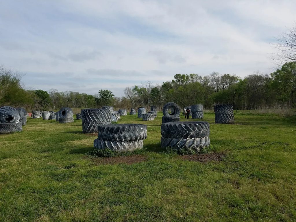One of the playing fields is stacked with huge tires, perfect for hiding and strategizing during games. Credit: Michael Burns