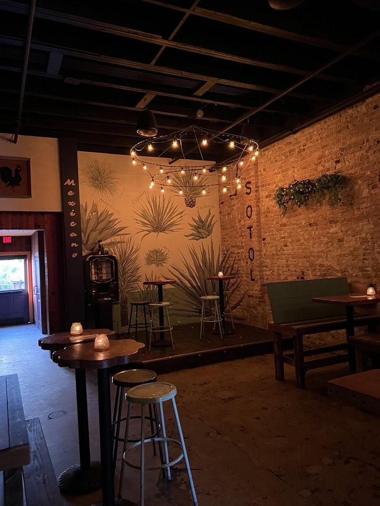 Inside Las Perlas, rustic Mexican-themed décor and intimate lighting create a spacious yet cozy vibe. Credit: James F.