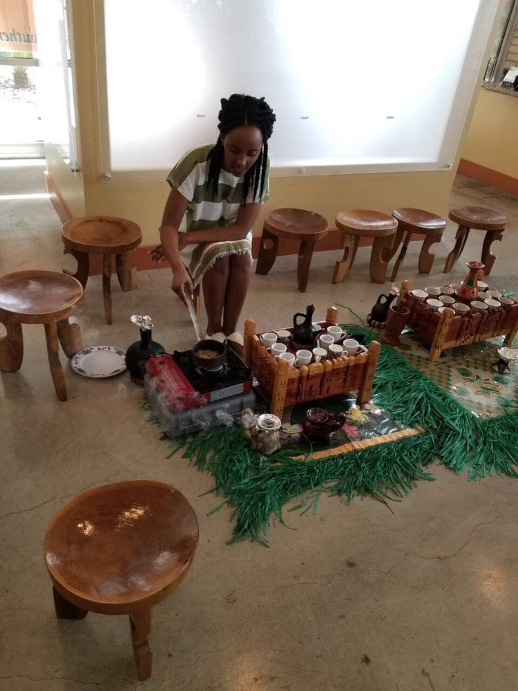 Coffee beans are roasted fresh as part of the Buna Ceremony, filling the room with rich aroma. Credit: Taste of Ethiopia