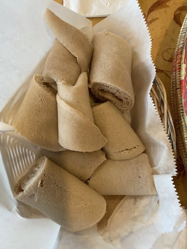 A basket full of injera, made fresh in-house, is ready to accompany every dish. Credit: Bhagyashree B.