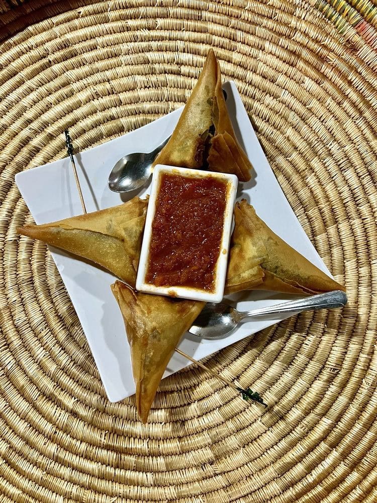 Lentil sambusa and beef sambusa appetizers are crowd favorites, bursting with flavor. Credit: Abida H.