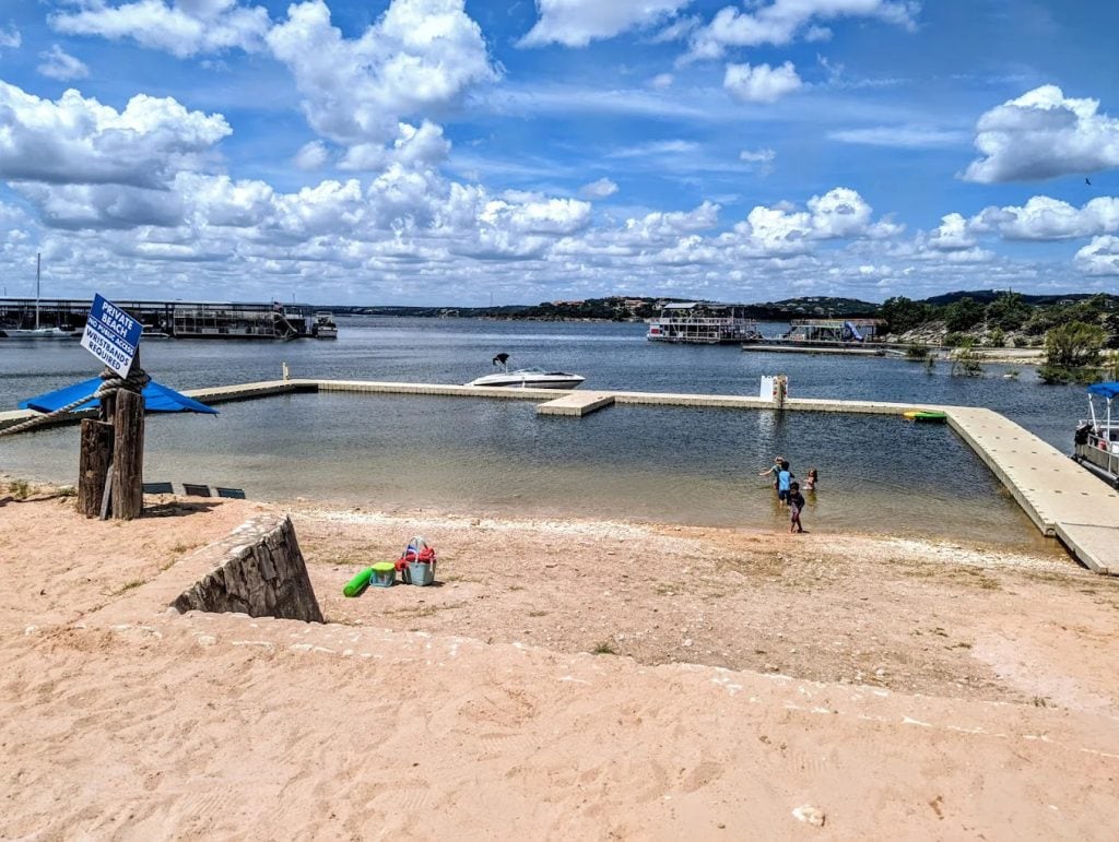 By day, the private wristband-only pool on Lake Travis ensures guests enjoy exclusive access without outside crowds. Credit: Ciara Lindley