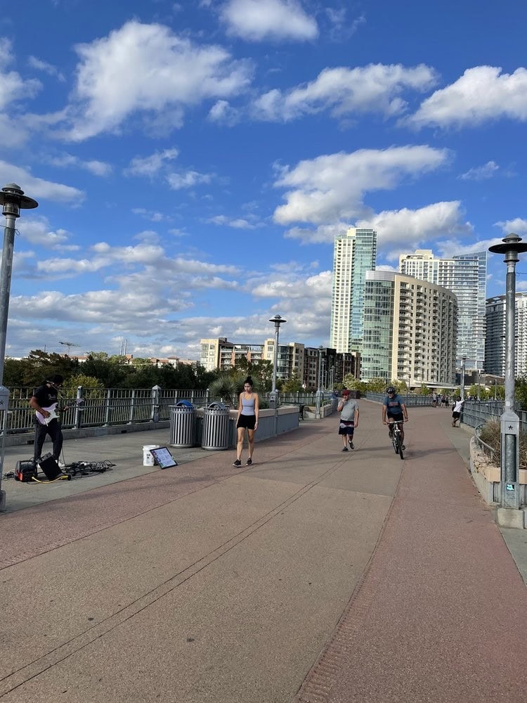 Locals flock to the wide trails by the lake, perfect for biking, jogging, or a scenic walk. Credit: Elizabeth M.