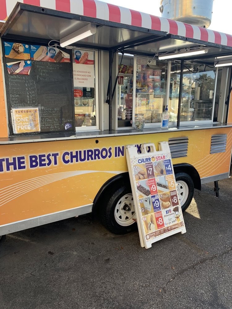 Churro Star’s bright yellow food truck serves up Texas’s best churros right from parking lots with the menu easy to spot. Credit: Felix G.
