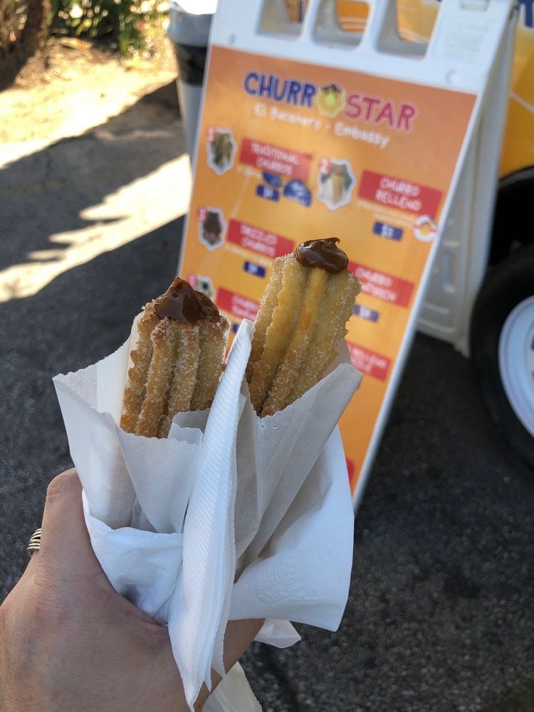 Churro relleno, filled with cajeta, delivers a sweet surprise inside every bite. Credit: Florecita R.