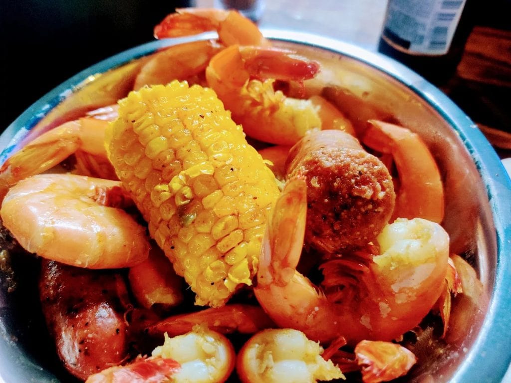 A seafood boil at Sharkies Bar and Grill overflows with flavor, featuring the freshest local catch. Credit: Danny Gibson