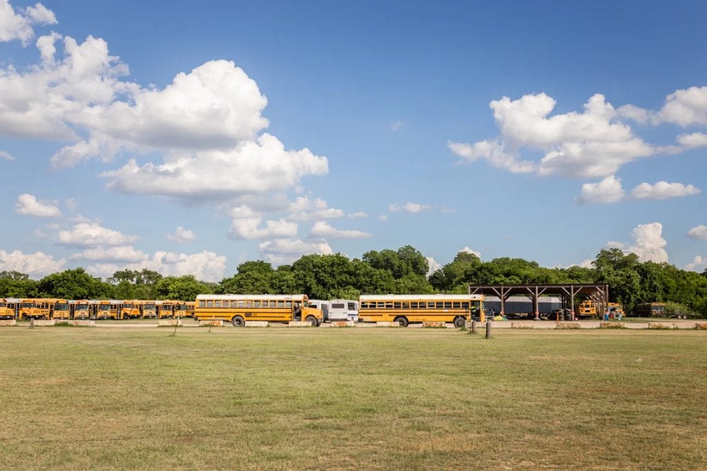 Don’s fleet of buses hauls guests to and from the river, keeping the tubing experience smooth and hassle-free. Credit: Don's Fish Camp