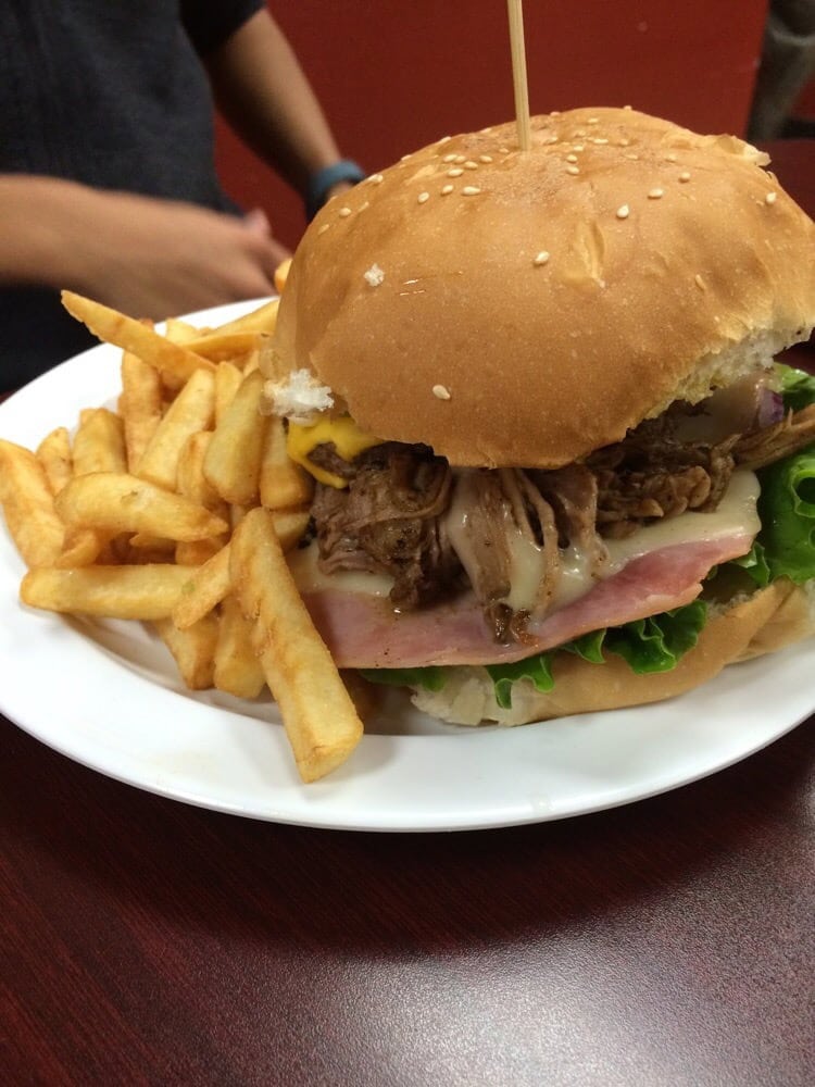 The El Cubanito burger fuses a Cuban sandwich with a Texas‑sized burger for a bold creation. Credit: Priyanka N.