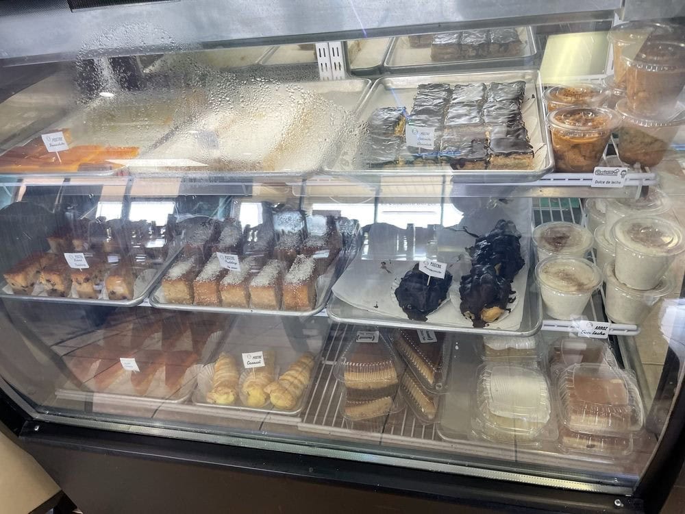 The pastry display case is filled with delightful Cuban treats ready to enjoy. Credit: Jessica R.