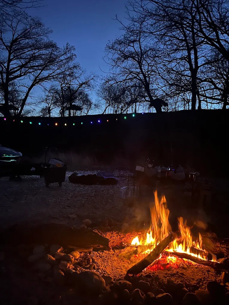 Campfires at Don’s Fish Camp make evenings cozy, adding warmth and fun to the riverside camping experience. Credit: Cameron Adams