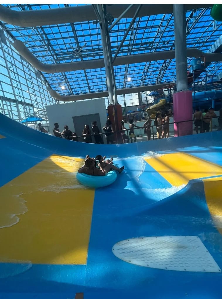 Guests brave the Yellowjacket Drop, twisting through an enclosed slide before plunging into a near‑vertical wall for a zero‑gravity thrill. Credit: LaShonda Douglas