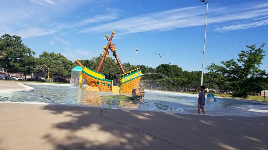 Another angle of the pirate ship reveals a playful alligator sculpture where kids can sit and enjoy. Credit: Bret Ostendorf