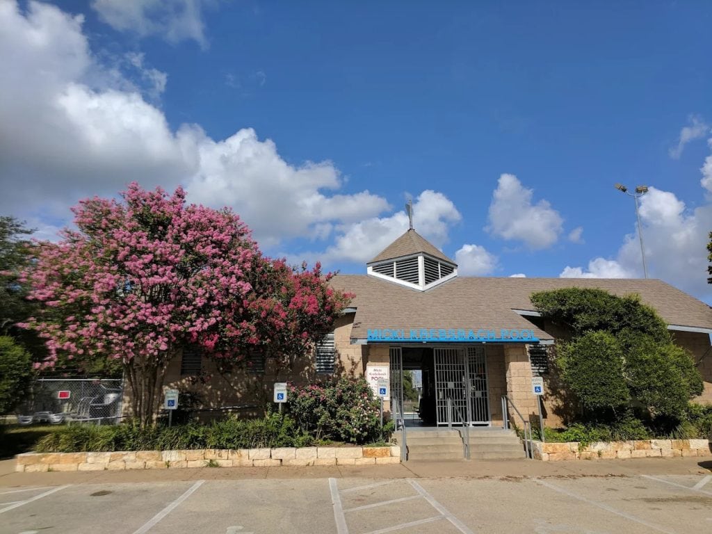 The façade of Micki Krebsbach Pool keeps things simple, welcoming guests to a fun-filled day. Credit: charles kerlin
