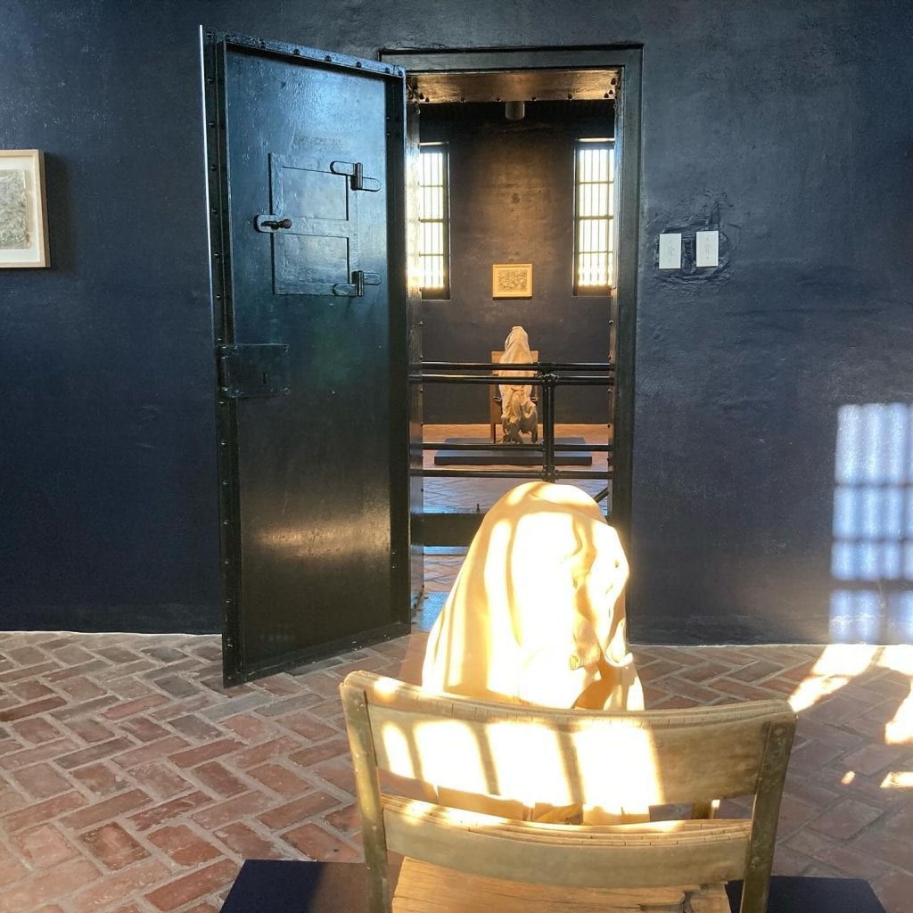 Joshua Hagler’s Cell Series: Nihil II installation as displayed at the Old Jail Art Center — contemporary art set against historic jail architecture. Credit: @oldjailartcenter