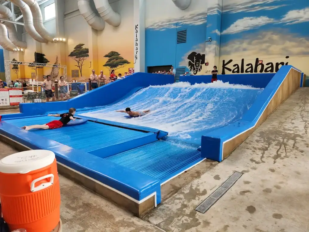 Another view of the FlowRider shows instructors guiding guests through the basics of surfing, making it fun for all skill levels. Credit: Lanette Ferguson