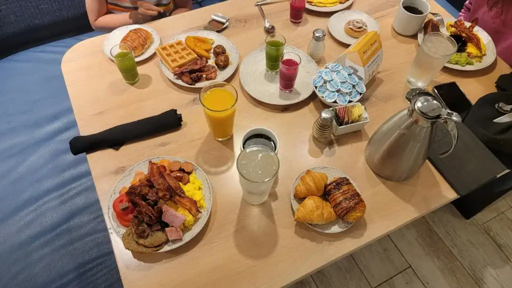 A full table spread at Kalahari tempts with pastries, meats, juices, and more, proving you’ll never need to leave for great food. Credit: CHARLIE KOURKOUNIAN