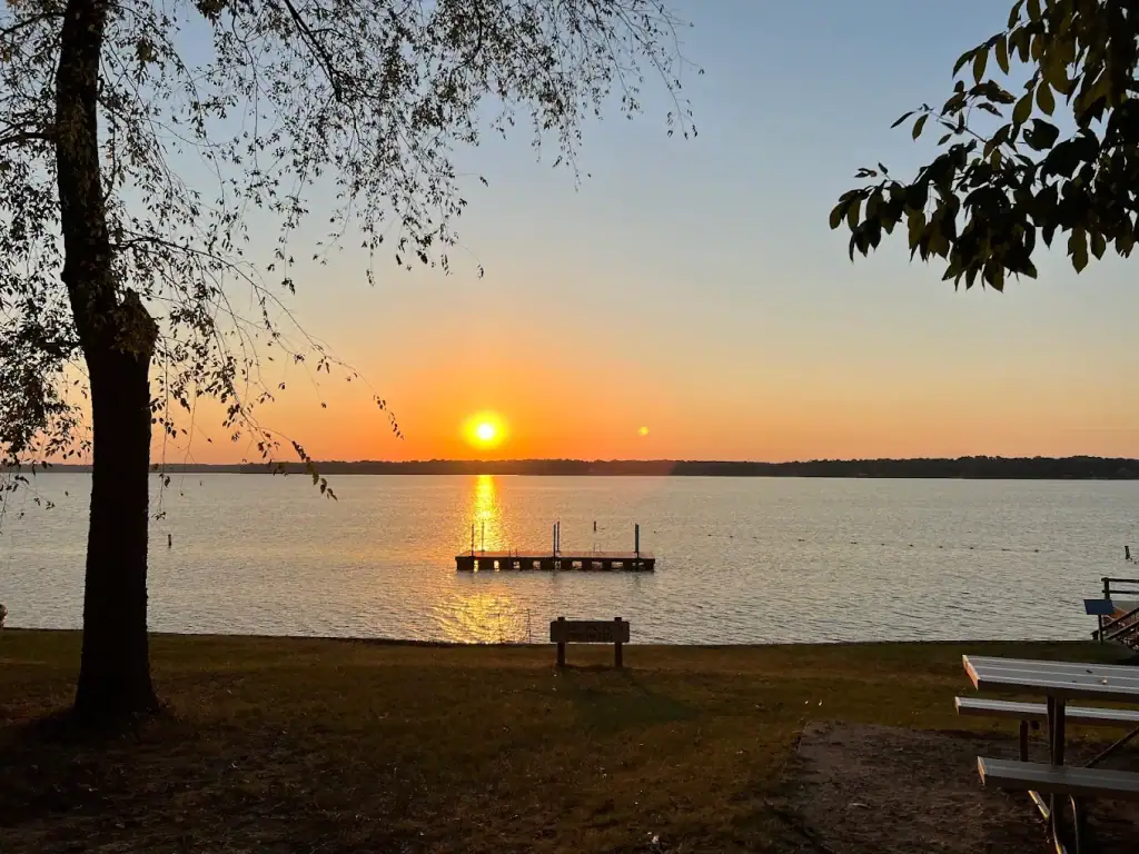 Surreal sunset over the calm lake at Lake Bob Sandlin State Park — glowing skies mirrored on still water for a truly relaxing end to the day. Credit: Ayesha Srinivasan