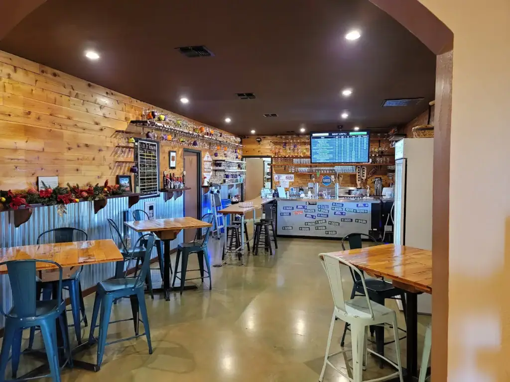 Save the World Brewery pairs modern woodsy charm with an endless lineup of craft beers you’ll want to savor. Credit: Dan Walsh