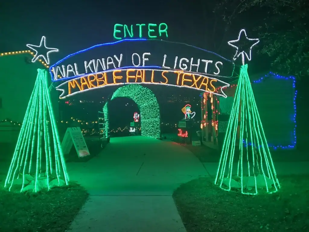 Step into the dazzling glow of Marble Falls’ Walkway of Lights at Lakeside Park, a sparkling spectacle for all ages. Credit: DeCarlos