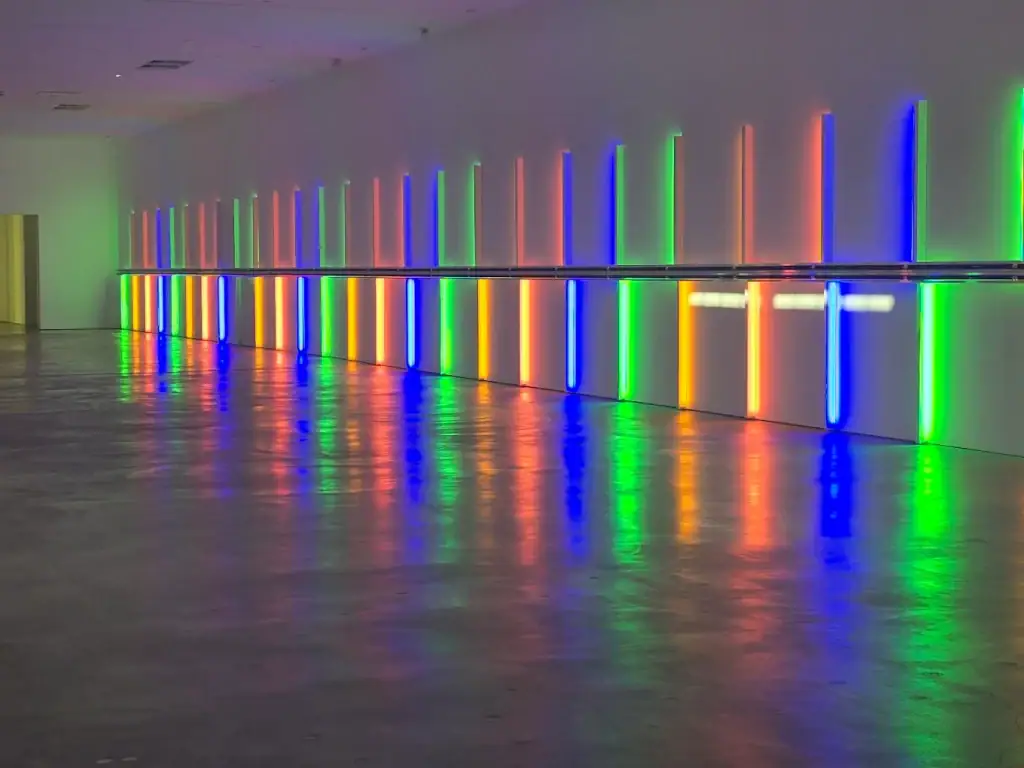 Dan Flavin’s fluorescent light installation at Richmond Hall transforms space into a glowing, immersive experience. Credit: NC Craven