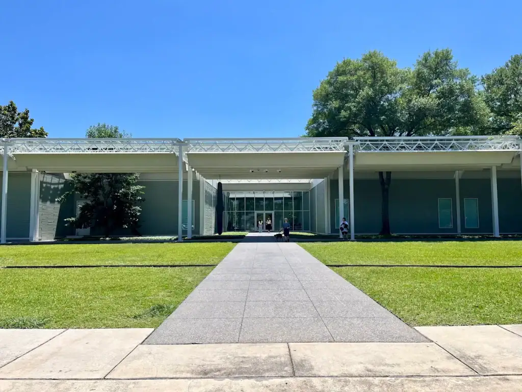 The Menil Collection greets visitors with a humble, unassuming façade that hides world-class treasures inside. Credit: Julia Emahiser