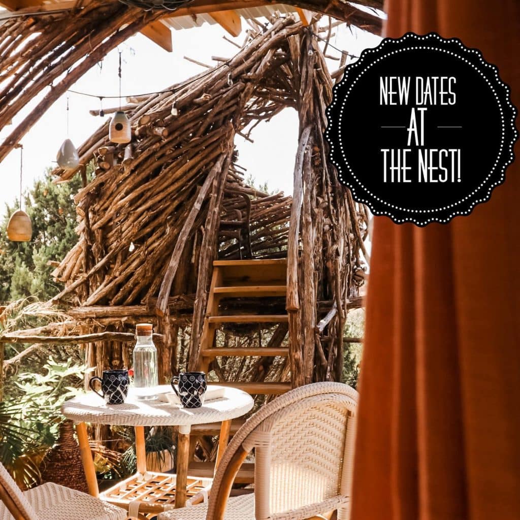 The outdoor patio at The Nest offers a cozy dining setup with views of the nest observatory, blending comfort with a strong connection to nature. Credit: @skyboxcabins via Instagram