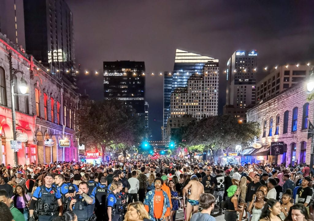 The Sixth Street Entertainment District in Austin is packed wall-to-wall with people. If you’re not into heavy partying, this overhyped spot is an easy skip. Credit: u/austintxdude via r/Austin