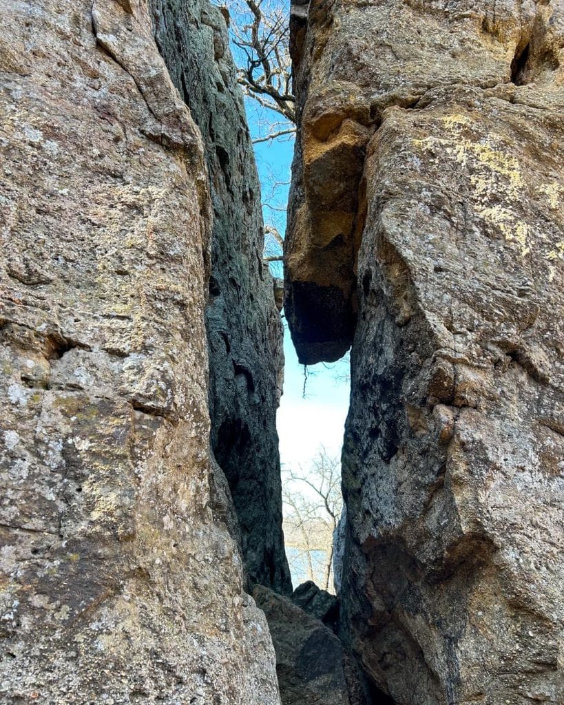 Two towering rock formations at Penitentiary Hollow create a narrow passage you can squeeze through—pure adventure at every turn. Credit: @visitmineralwells via Instagram