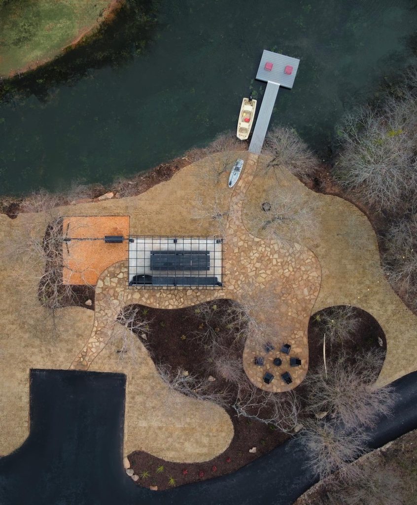 A straight-down view of Waters Edge Commons, the shared outdoor space for guests staying at Live Oak Lake. Credit: @liveoaklake via Instagram