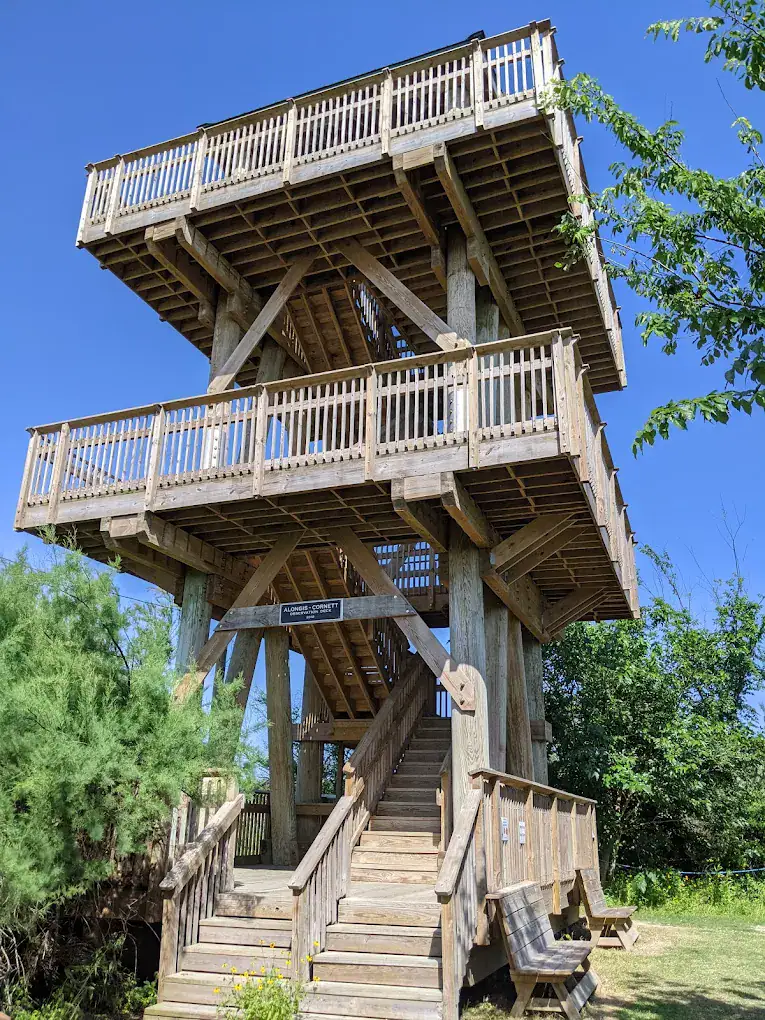 The viewing deck at Quintana Neotropical Bird Sanctuary offers prime birdwatching, a must-do near Surfside Beach. Credit: sindhu k 
