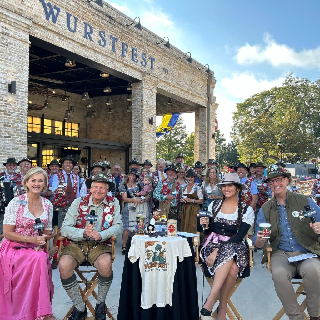 Texans celebrate Wurstfest in traditional German attire—honoring beer, sausages, music, and deep-rooted German heritage. Credit: @weareaustin via Instagram