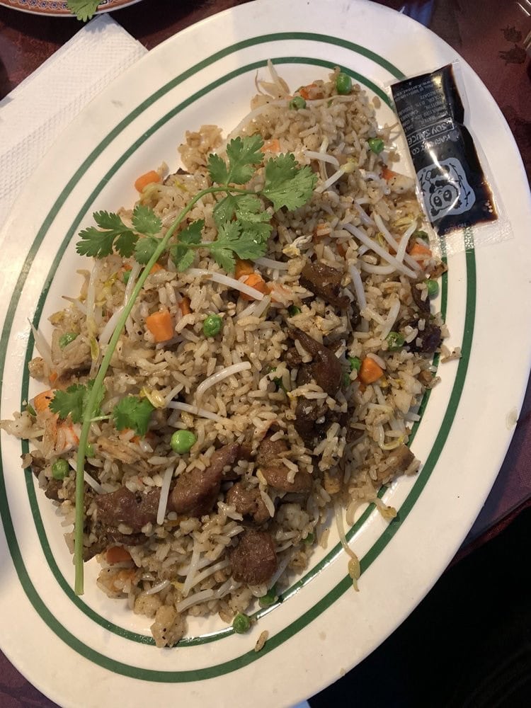 The combination fried rice mixes meat, vegetables, bean sprouts, and rice into a flavorful plate. Credit: Pajoua X.