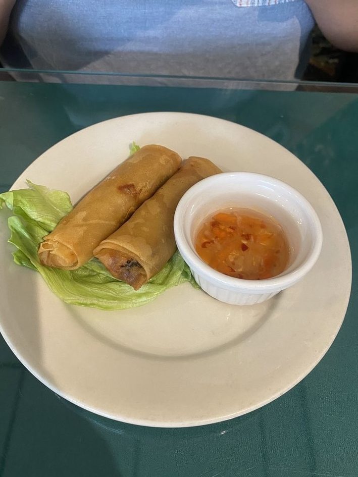 A crispy egg roll served with spiced vinegar makes for a tasty starter. Credit: Ty'Nyria S.