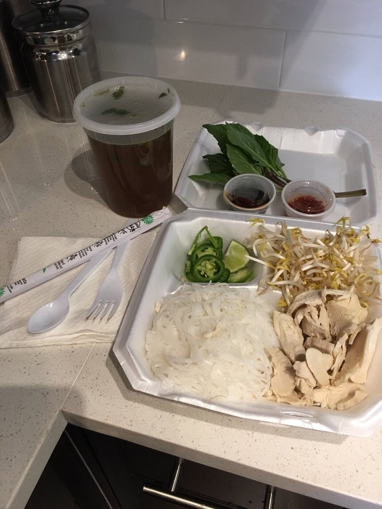 Pho Chau’s takeout pho keeps components separate to avoid sogginess, ensuring freshness at home. Credit: Holly T.