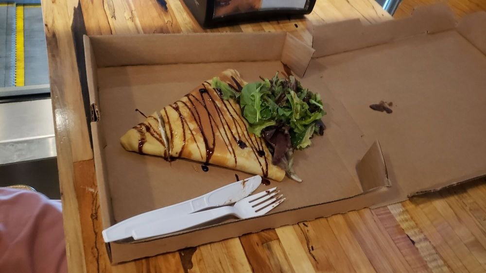Whisk and Egg’s goat crepe combines goat cheese, dried figs, balsamic, greens, and walnuts for a rich, fresh bite. Credit: Kim D.