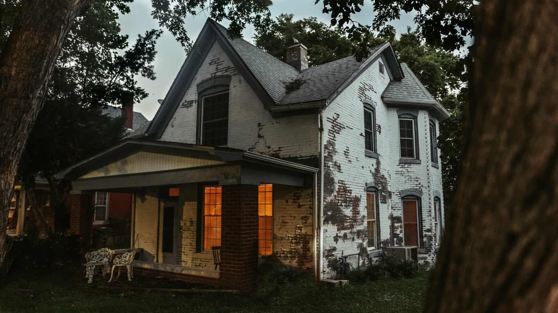 The Sallie House lit up at dusk in Atchison, Kansas