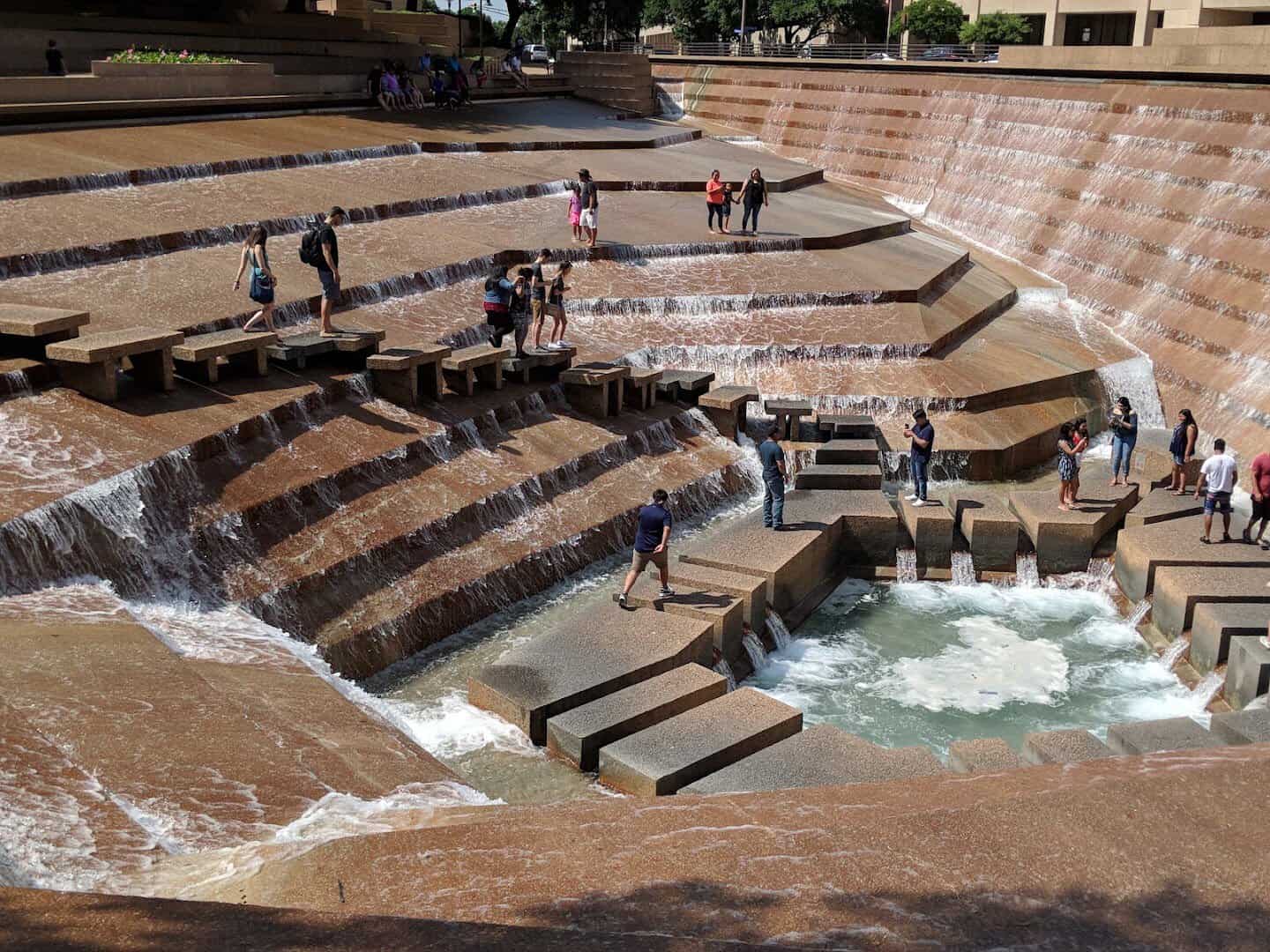 Water cascading down the terraced steps of the Active Pool at the Fort Worth Water Gardens